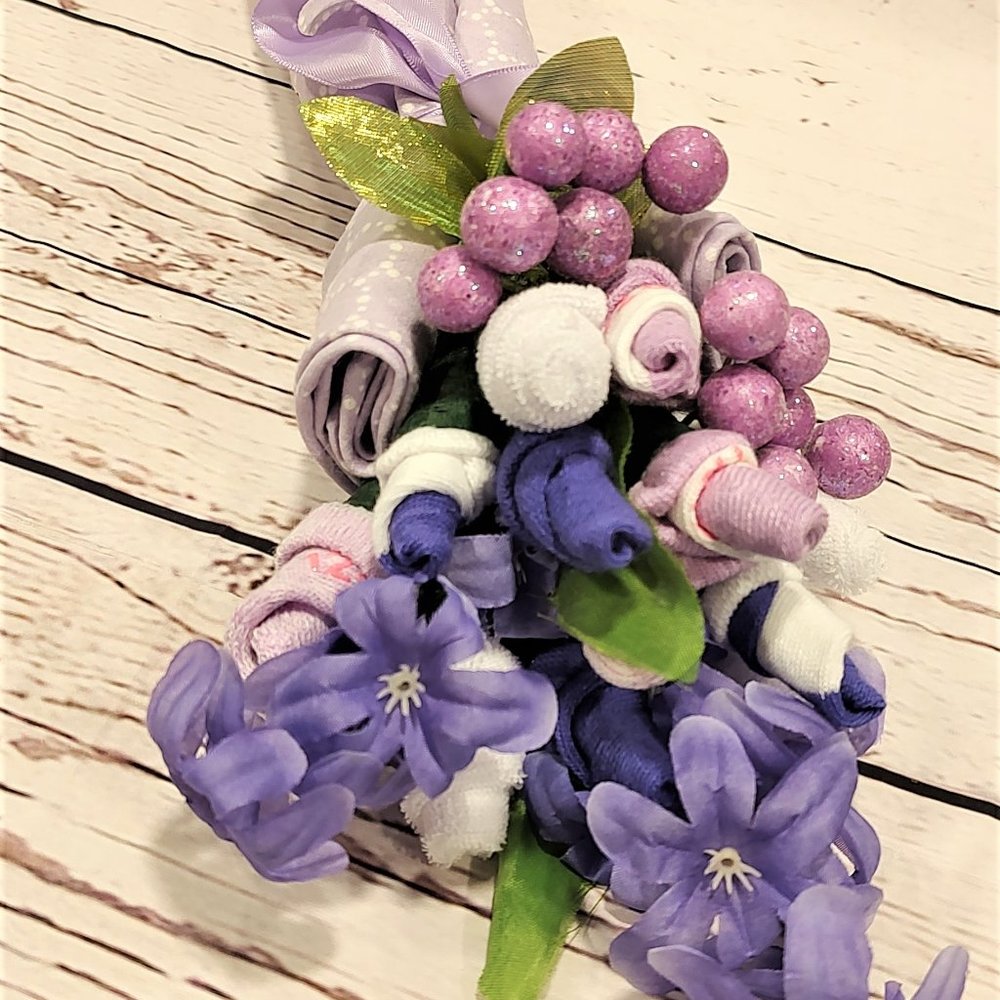 Baby shower sock rose receiving blanket bouquet